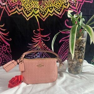 Coach xs Shell Pink Wristlet.